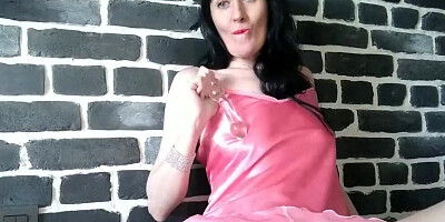 Naughty MILF is spreading legs and playing with her hairy pussy