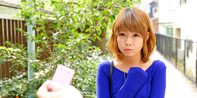 A couple of strangers are confronting Fu Sazanami outdoor
