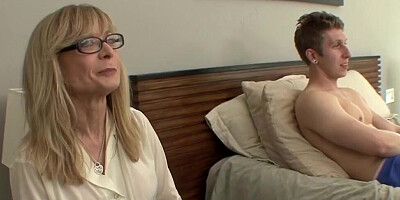 MILF Nina Hartley wears stockings for this hardcore sex scene
