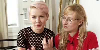 Two flashy lesbians are being interviewed and involved in a hot action
