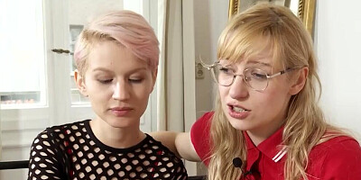 Two flashy lesbians are being interviewed and involved in a hot action