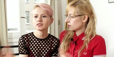 Two flashy lesbians are being interviewed and involved in a hot action