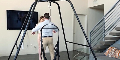 Short-haired Tristan Summers is being fucked in the sex swing