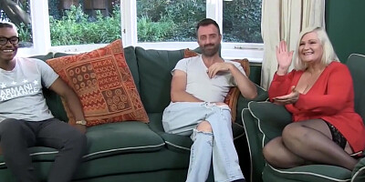 GILF in leather corset takes on two massive cocks