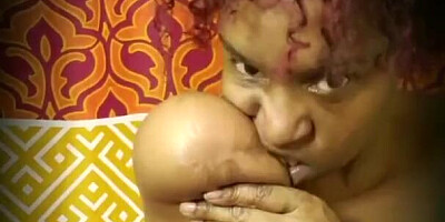 Chubby Black Woman Plays With Her Big Saggy Tits On the Camera