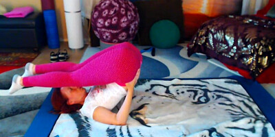 Amateur MILF is practicing some yoga in front of the camera