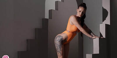 Tattooed doll Maddy May shows her curvy body and tight puss