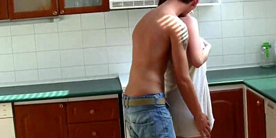 Leila Smith is passionately fucking with her stepson in the kitchen