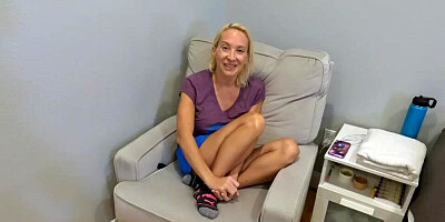 Naughty masseur rubs mature woman's cunt with oil during a session