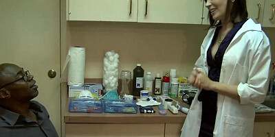 Sexy looking doctor having fun with a horny black guy