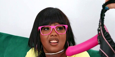 Ebony cougar is being strap-on fucked by a kinky lesbian