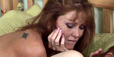 Redhead video with smiling Darla Crane and Madison Young from Lesbian Older Younger
