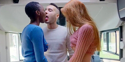 Bald ebony chick has a threesome with a pale redhead