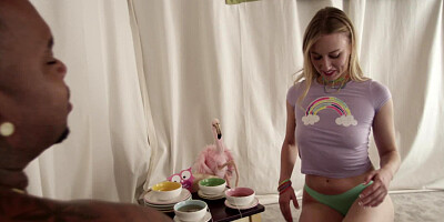 A blonde is having interracial sex with a black dude with a large cock