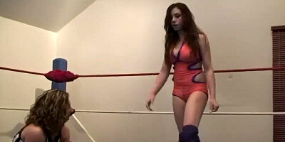 Two babes and one guy are wrestling on the floor