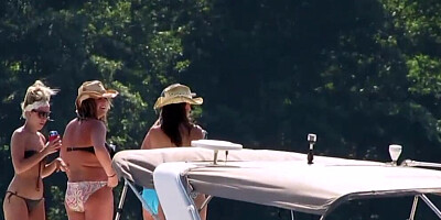 Camera caught a couple of topless babes while on their summer vacation