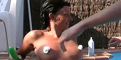 Two amazing looking German chicks sharing a cock near the pool