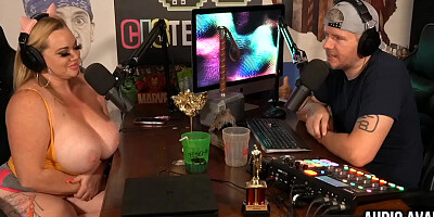 Blonde pornstar with a humongous tits is having a podcast interview