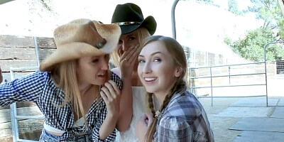 A couple of girls are trying out cowgirl riding on a single stiff prick