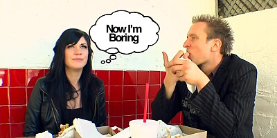 Dark haired porn star goes down for cock sucking