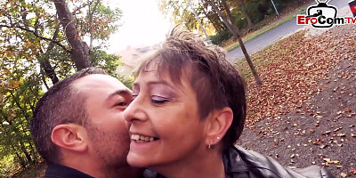 Naughty MILF is sucking cock and having sex in this public park