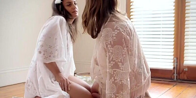 Two marvelous girls are passionately kissing and licking one another