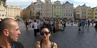 Tattooed and busty MILF pornstar talks kinky during a strolling interview outdoors