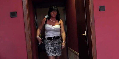 Mature woman is massaging her partner's dick with her feet