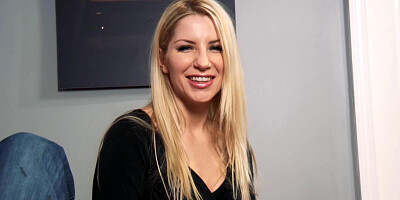 Naughty blonde cougar stares at the camera with a dick in her mouth