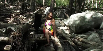 Girl gets horny hiking in the woods and plays with her kitty