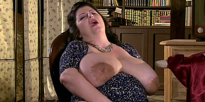 Fat woman pulls her big tits out and plays with that wet pussy