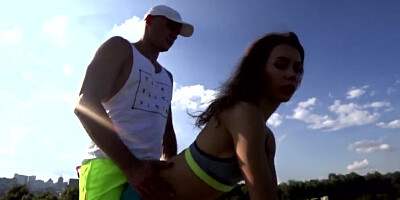 Sporty chick and her boyfriend are making one of their outdoor banging videos