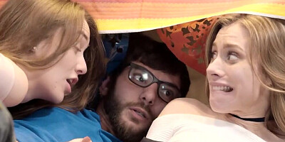 Geekish guy is pumping the moist pussies of two hippie chicks in a threesome