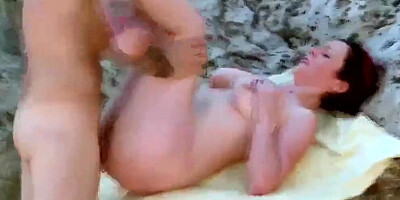 Hard anal with the pretty milf on the beach in the sunshine