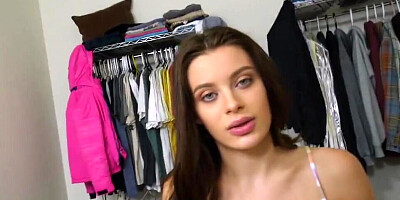 Lana Rhoades flirts with the camera while handling that big pecker