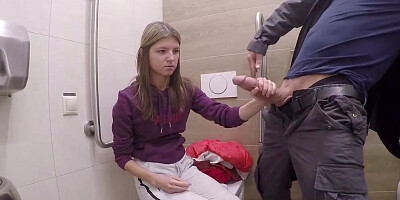 Gina Gerson blows a guy in the restroom and rides his dick