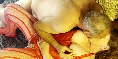 Mature woman in red lingerie is fingered and stimulated with sex toy