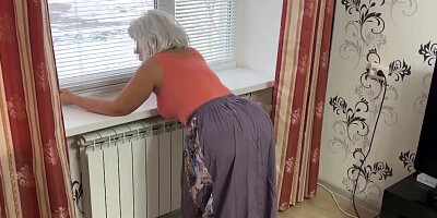 Mature milf in a long skirt engaged in anal sex