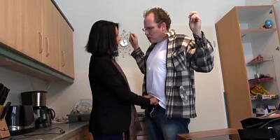 German bookworm drills black-haired MILF in kitchen