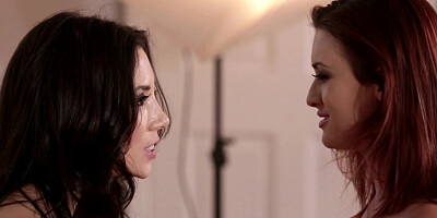 A redhead and a brunette love to hold one another and kiss one another