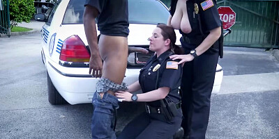 Black amn is banging two slutty female cops outside