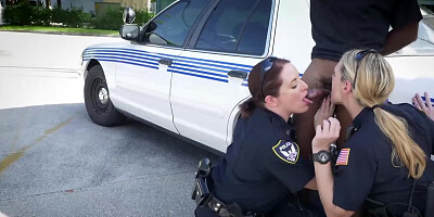 Black amn is banging two slutty female cops outside