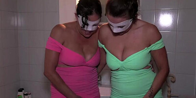 Two masked cougars are making out while fucking with that lad