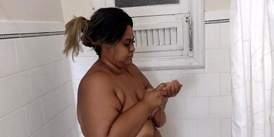 Chubby Latina takes a shower and goes down to suck a dick