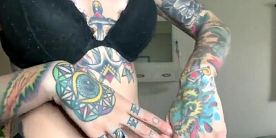 Inked minx is all alone and will play with her favorite sex toy