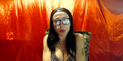 Nerdy MILF talks dirty and teases us with those big tits