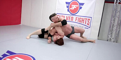Mistress Kara and guy are wrestling and doing 69 on the floor
