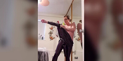 Essex Girl Lisa dressing up in my latex catsuit