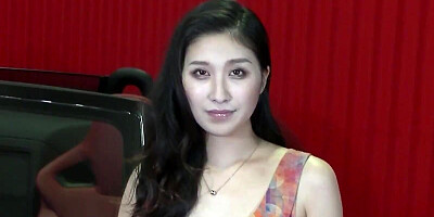 Gorgeous Asian woman is stripping nude and revealing her juicy private parts