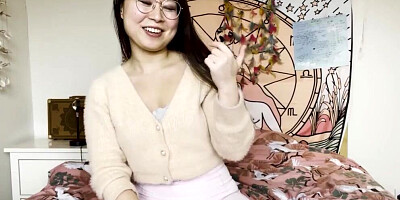 Nerdy Asian doll rubs her twat in front of the camera